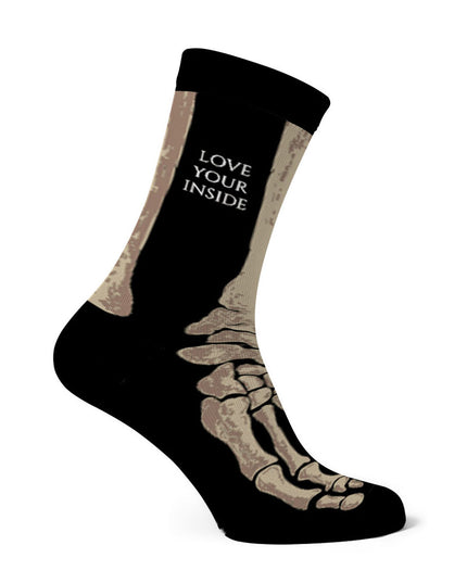 Skarpety długie bawełniane unisex z wzorem kości.
- Widok od boku.