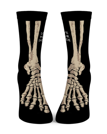 skarpety długie bawełniane unisex z wzorem kości.
- Widok od przodu.